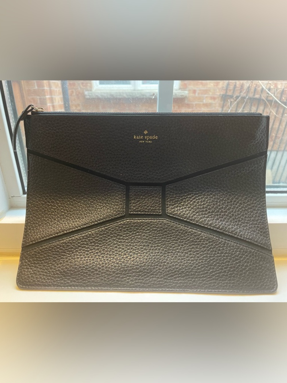 kate spade black pebbled leather clutch with gold logo